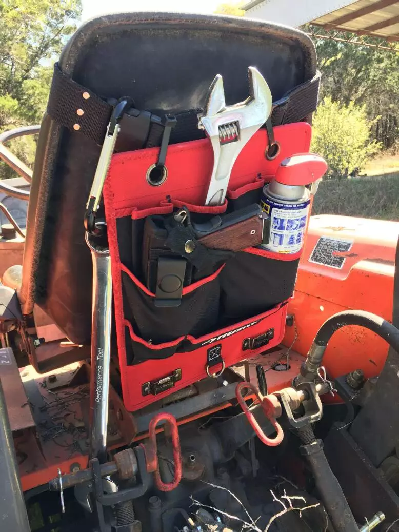 Husky tool holder on tractor.