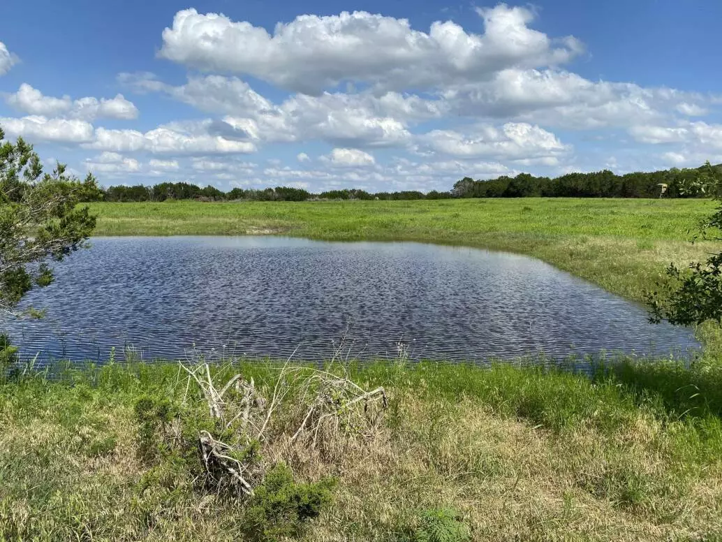 Photo of a stock tank on a ranch